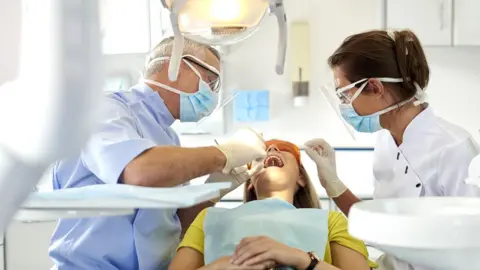 Getty Images patient getting dental treatment