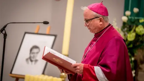 PA Media The Bishop of Derry, Most Reverend Donal McKeown addressing the congregation.