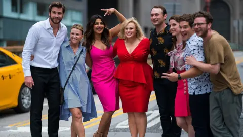 Getty Images Rebel Wilson filming Isn't It Romantic alongside Liam Hemsworth, Priyanka Chopra and Adam Devine