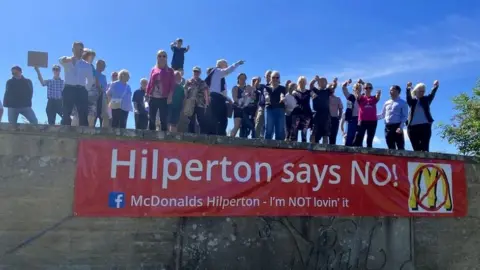 Protestors at the planned site