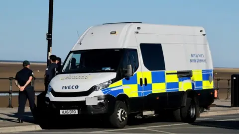 GNP Royal Navy officers at the beach