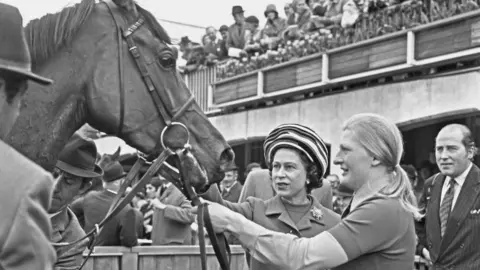 Getty Images Queen Elizabeth II with her racehorse Highclere, after the horse won the 1000 Guineas Stakes at Newmarket, UK, 2nd May 1974.