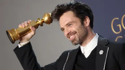 Getty Images Sebastian Stan, winner of the Best Performance by a Male Actor in a Motion Picture - Musical or Comedy Award 