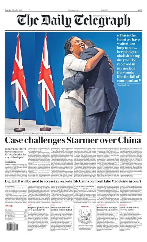 The headline on the front page of the Daily Telegraph reads: "Case challenges Starmer over China". Above is a separate story featuring Kemi Badenoch hugging her husband Hamish in front of two union jack flags and a blue wall at the Conservative party conference.