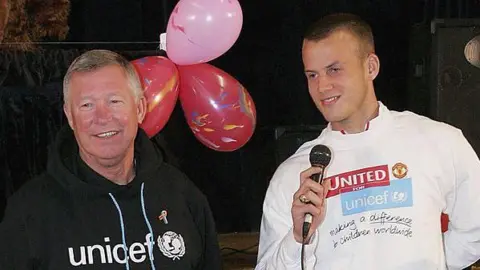 Luke Steele and Sir Alex Ferguson in 2006