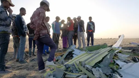 Getty Images People gather at the Ethiopian Airline crash site