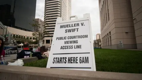 Getty Images A sign is placed outside the civil case for Taylor Swift vs David Mueller at the Alfred A. Arraj Courthouse on August 10, 2017 in Denver, Colorado.