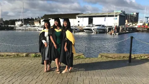 University of Suffolk Three of the quadruplets