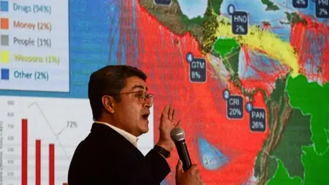 AFP Honduras' President Juan Orlando Hernandez delivers a press conference at the presidential house in Tegucigalpa, on 24 March