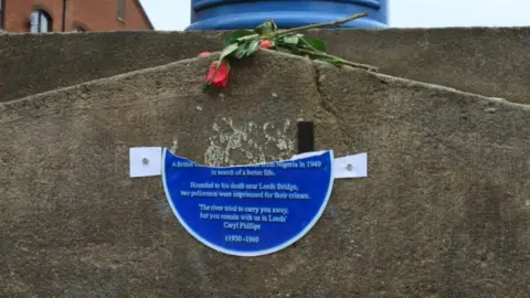 The damaged replacement plaque to David Oluwale