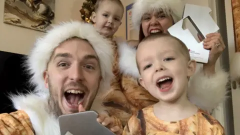 Official Charts Company On a roll: LadBaby is again joined by his wife Roxanne and their children on his latest festive hit