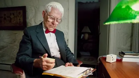 Getty Images American psychiatrist and professor Dr Aaron Beck makes notes on a clipboard in 1994 image