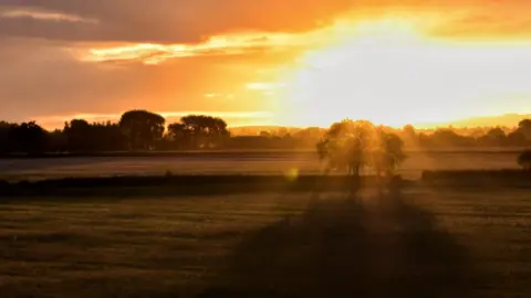 Steve Forse Sunrise looking towards Islip