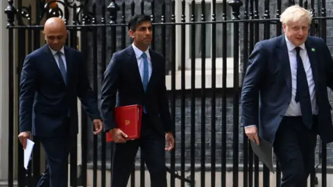 Getty Images Javid, Sunak, Johnson in Downing st