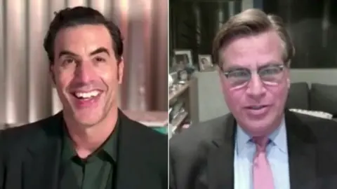 Getty Images Sacha Baron Cohen and Aaron Sorkin