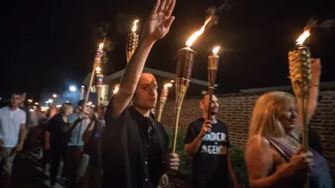 Getty Images At a 2017 rally in Charlottesville, far-right activists chanted "Jews will not replace us"