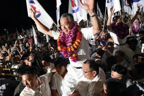 Getty Images Singapore's Prime Minister Lee Hsien Loong, of the People's Action Party celebrates after winning the general election in Singapore on 12 September 2015