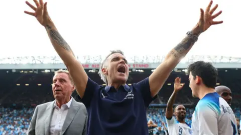 Getty Images Robbie at Soccer Aid - Burslem Tatto visible