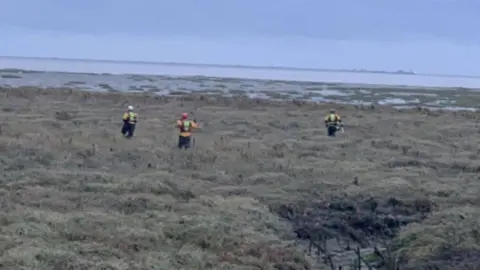 HM Coastguard Emergency services searching for dog