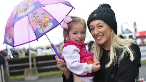 Pacemaker Ciara Mollan and her young daughter Darcy smiling at the Balmoral Show