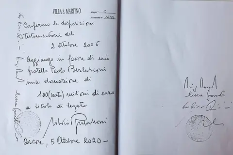 REUTERS/Claudia Greco A photocopy of the handwritten will of former Italian Prime Minister Silvio Berlusconi, dated October 5, 2020, provided by his solicitor, in Milan, Italy, July 6, 2023