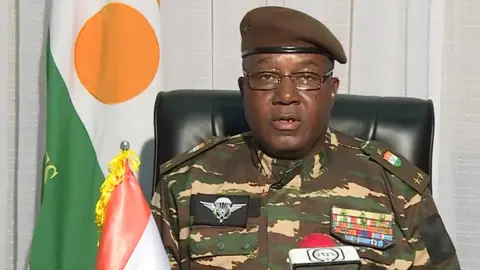 ORTN General Abdourahmane Tiani (has also been referenced as Abdourahmane Tchiani and Omar Tchiani) makes a televised address to the nation of Niger explaining the reasons for the coup, 28 July 2023. President Mohamed Bazoum is being held captive by his own guards