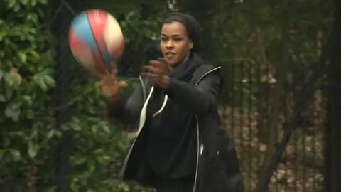 Ayan Hersi playing basketball