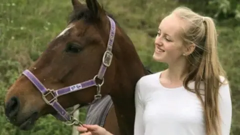 Family photo Gracie with her horse