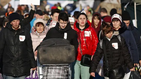 Getty Images Ukraine refugees arrive in Poland