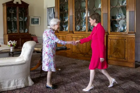 PA Media Queen Elizabeth II receives First Minister of Scotland Nicola Sturgeon during an audience at the Palace of Holyroodhouse in Edinburgh, as part of her traditional trip to Scotland for Holyrood Week, on 29 June 2022