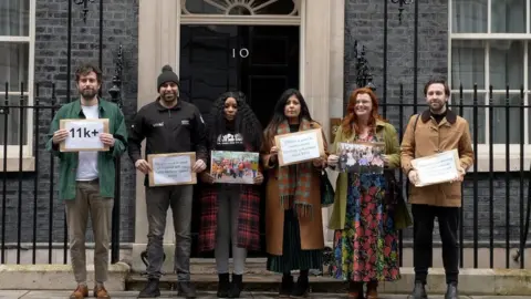 Supplied Campaigners outside Downing Street