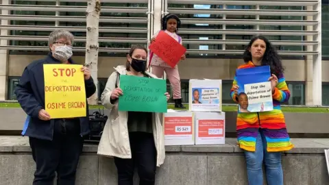 Family handout Protestors against Osime Brown's deportation