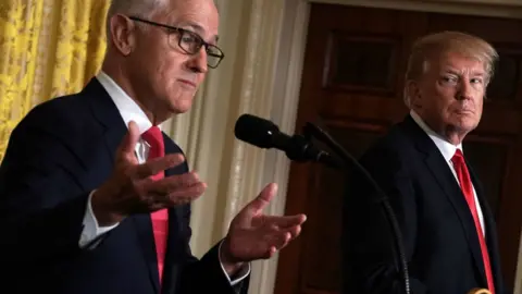 Getty Images Former US President Donald Trump (right) and former Australian Prime Minister Malcolm Turnbull participate in a joint news conference