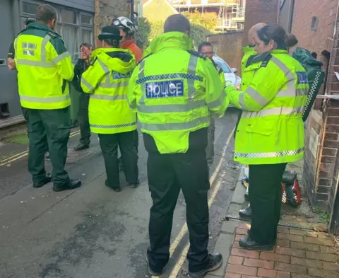 Eddie Mitchell Emergency teams at scene