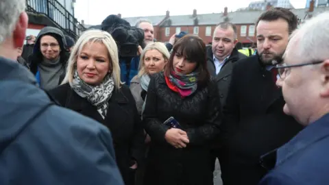 PA Sinn Féin deputy leader Michelle O'Neill (left) and MP Elisha McCallion (centre) and SDLP leader Colum Eastwood attended the announcement