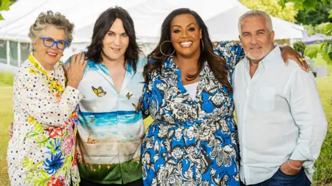 Mark Bourdillon/Channel 4 Left-right: Dame Prue Leith, Noel Fielding, Alison Hammond and Paul Hollywood in a promotional shot for the new series of The Great British Bake Off