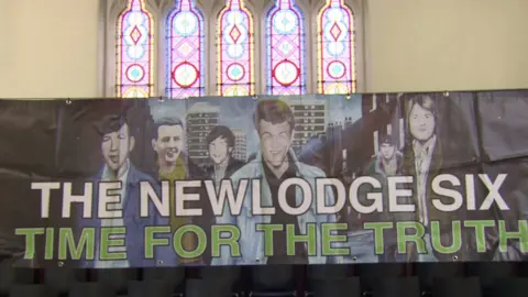 Banner promoting justice campaign for the six men killed in the New Lodge area of Belfast in February 1973