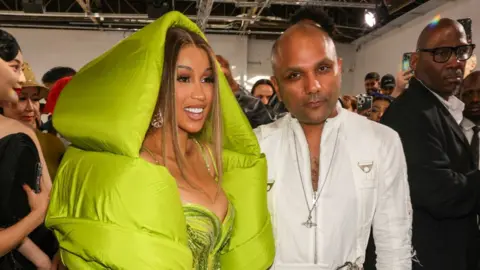 Getty Images Cardi B and Gaurav Gupta attend the Gaurav Gupta Haute Couture Fall/Winter 2023/2024 show as part of Paris Fashion Week on July 06, 2023 in Paris, France