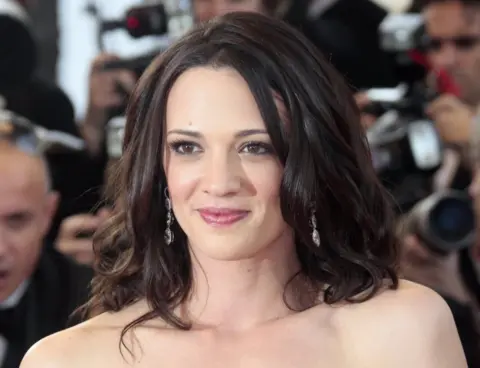 AFP Italian actress and director Asia Argento poses upon her arrival for the opening ceremony and the screening of 3D animated movie "Up" during the 62nd Cannes Film Festival on May 13, 2009