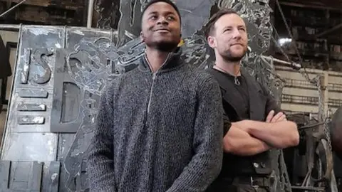 Legacy WM Canaan Brown and artist Luke Perry