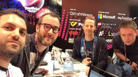 Panos Zannettos Daniel, second left, in the press centre at Eurovision 2014 in Vienna