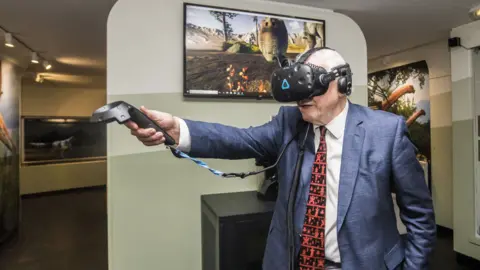PA Sir David Attenborough with VR headset