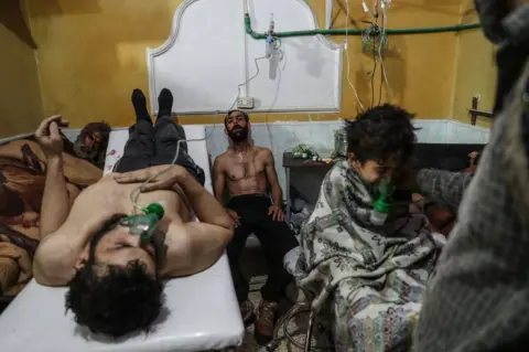 Mohammed Badra / European Pressphoto Agency People are treated in a hospital