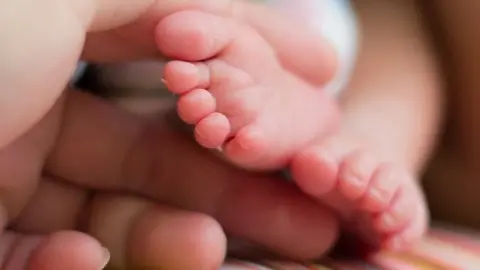 Getty Images Baby's feet