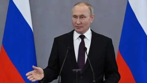 EPA Vladimir Putin at news conference in Astana