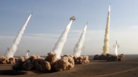 AFP IRGC units fire Shahab-2 long-range ballistic missiles during an exercise in the desert near Qom on 2 November 2006