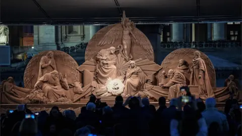 EPA The Vatican nativity Scene, sculpted from sand, is inaugurated at St Peter's Square in Vatican City on 7 December 2018