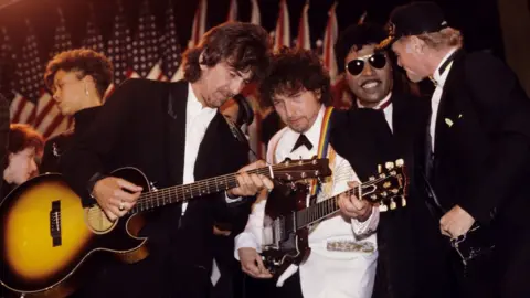 Getty Images George Harrison and Bob Dylan