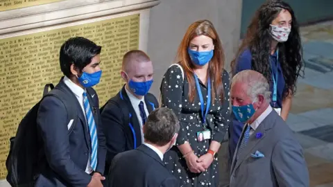 PA Media The Prince of Wales talking to schoolchildren at the museum