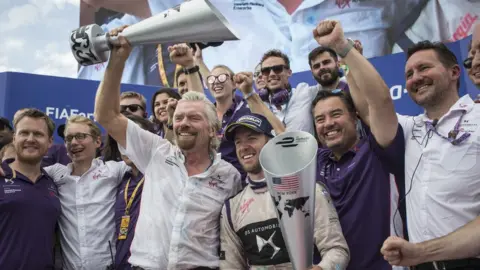 Getty Images Richard Branson celebrating the team win at the New York e-prix last season